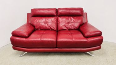 A DESIGNER ITALIAN RED LEATHER TWO SEATER SOFA W 180CM.