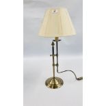 A MARKS AND SPENCER ADJUSTABLE TABLE LAMP AND SHADE - SOLD AS SEEN.