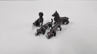 A GROUP OF 4 SOLID SILVER MINIATURE DOG ORNAMENTS, LONDON ASSAY.