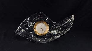 AN IMPRESSIVE CRYSTAL FISH BEARING INDISTINCT SIGNATURE INSET WITH A CIRCULAR SWISS CLOCK MARKED