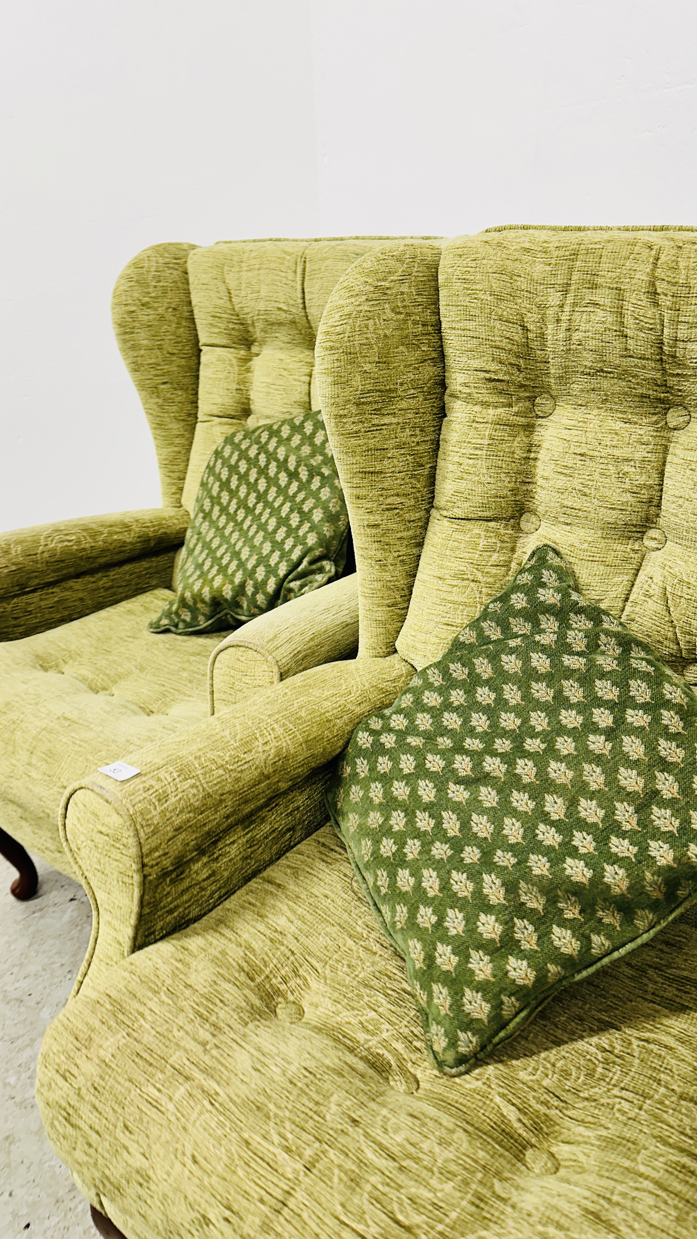 A PAIR OF SHERBORNE GREEN UPHOLSTERED WINGED EASY CHAIRS. - Image 9 of 10