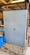 A STEEL TWO DOOR FIRE RESISTANT CABINET WITH ADJUSTABLE SHELVING - KEY WITH AUCTIONEER - W 122CM D