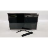 A LINSAR 24 INCH TV AND BRACKET MODEL: 24 LED3000 + REMOTE - SOLD AS SEEN.