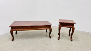 A MODERN 2 DRAWER MAHOGANY FINISH COFFEE TABLE ALONG WITH MATCHING LAMP TABLE.