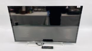 A SONY BRAVIA 40 INCH TV WITH REMOTE - SOLD AS SEEN.