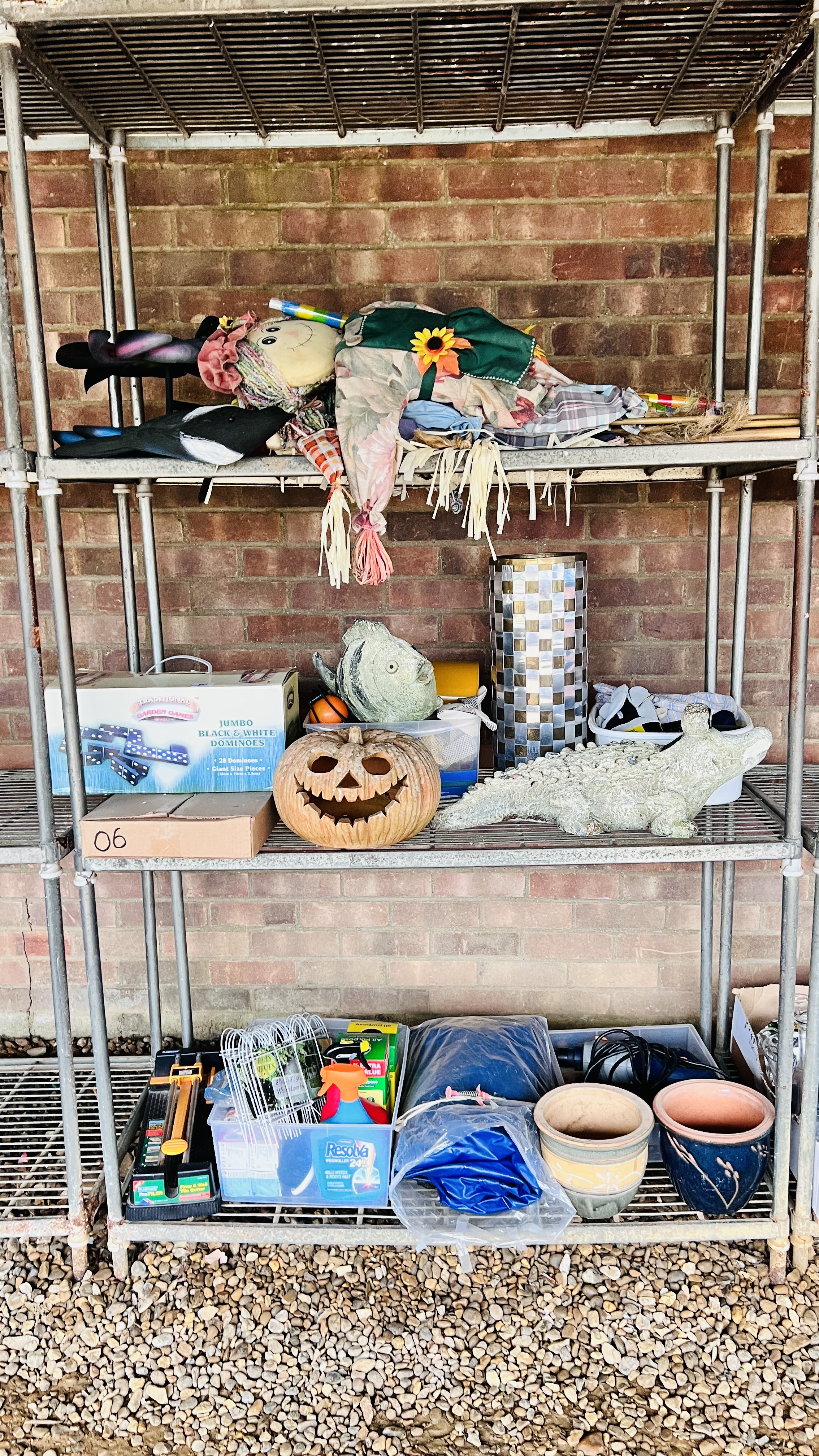 A GROUP OF GARDEN SCARECROWS, 2 PLANTERS, A METAL WATERING CAN, FISH AND CROCODILE GARDEN ORNAMENTS,