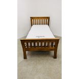 A GOOD QUALITY SOLID OAK SINGLE BED FRAME WITH SILENTNIGHT MIRROR POCKET 800 MEMORY MATTRESS.