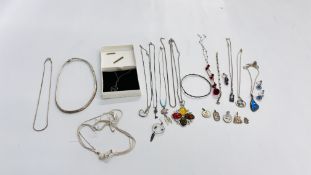 A COLLECTION OF SILVER AND WHITE METAL JEWELLERY TO INCLUDE MANY PENDANT NECKLACES ETC.