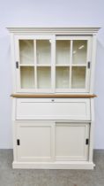 A MODERN MARKS & SPENCER "GREENWICH" CREAM FINISH BUREAU BOOKCASE WITH SLIDING DOORS AND FITTED