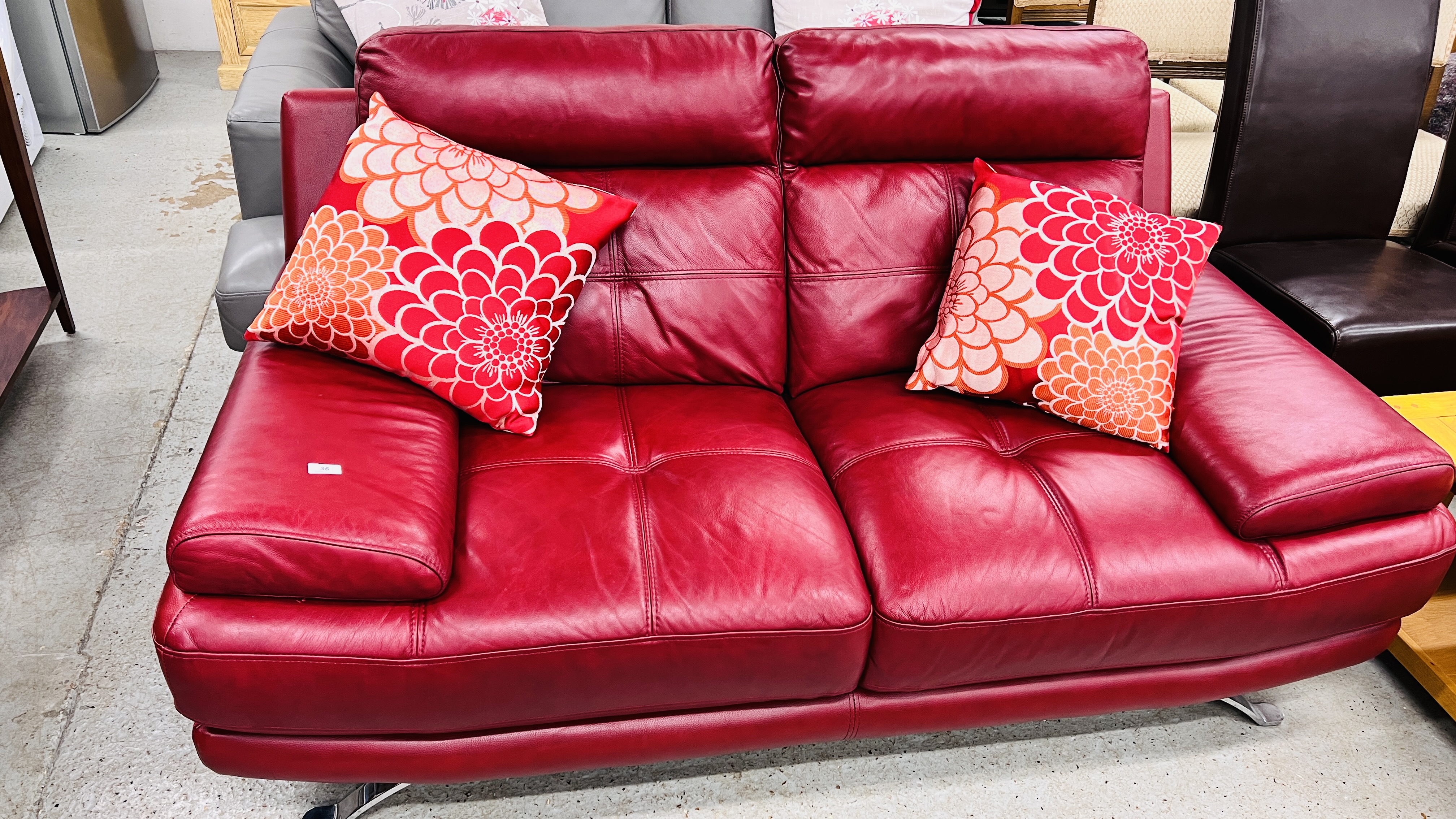A DESIGNER ITALIAN RED LEATHER TWO SEATER SOFA W 180CM. - Image 10 of 10