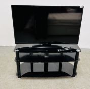 A LINSAR 43 INCH LED SMART TV WITH INTEGRAL DVD PLAYER COMPLETE WITH REMOTE AND 3 TIER STAND - SOLD