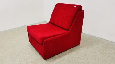 A RED UPHOLSTERED SINGLE SOFA BED.