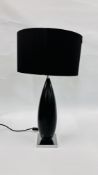 A MODERN DESIGNER CHROME AND BLACK FINISH TABLE LAMP AND BLACK SHADE H 66CM - SOLD AS SEEN.