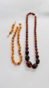 TWO AMBER TYPE NECKLACES.