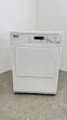 A MIELE HONEYCOMB CARE T8722 TUMBLE DRYER - SOLD AS SEEN.