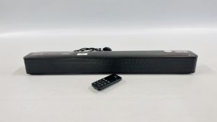 AN LG SOUND BAR MODEL SK 1 & REMOTE - H 65CM - SOLD AS SEEN.