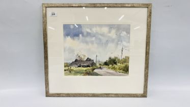 A FRAMED AND MOUNTED LANDSCAPE WATERCOLOUR BEARING SIGNATURE PETER GILMAN W 34CM X H 27CM.