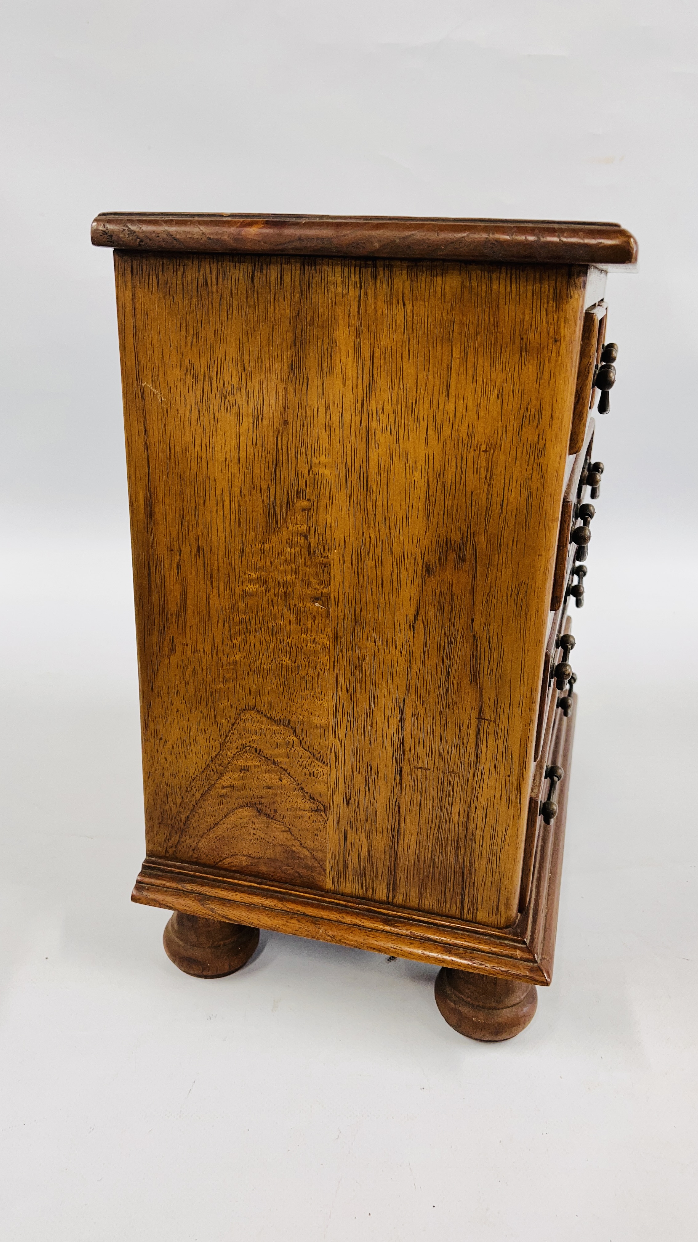 A MINIATURE 2 OVER 3 OAK CHEST OF DRAWERS, W 36CM X D 23CM X H 40CM. - Image 6 of 6