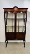 A VINTAGE STYLE MAHOGANY GLAZED TWO DOOR DISPLAY CABINET WITH SHAPED PEDIMENT,