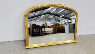 A REPRODUCTION GILT FRAMED OVER MANTEL MIRROR MAX WIDTH 125CM, H 86CM.