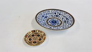 A ROYAL CROWN DERBY IMARI PATTERN SAUCER ALONG WITH A ROYAL CROWN DERBY BLUE AND WHITE GILDED LILY