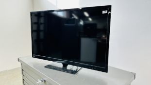 BUSH 40" FLAT SCREEN FULL HD TV WITH DVD PLAYER - SOLD AS SEEN.