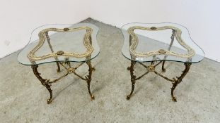 A PAIR OF ORNATE GILT FINISHED CAST FRAMED GLASS TOP OCCASIONAL TABLES WITH CROSS STRETCHER SUPPORT
