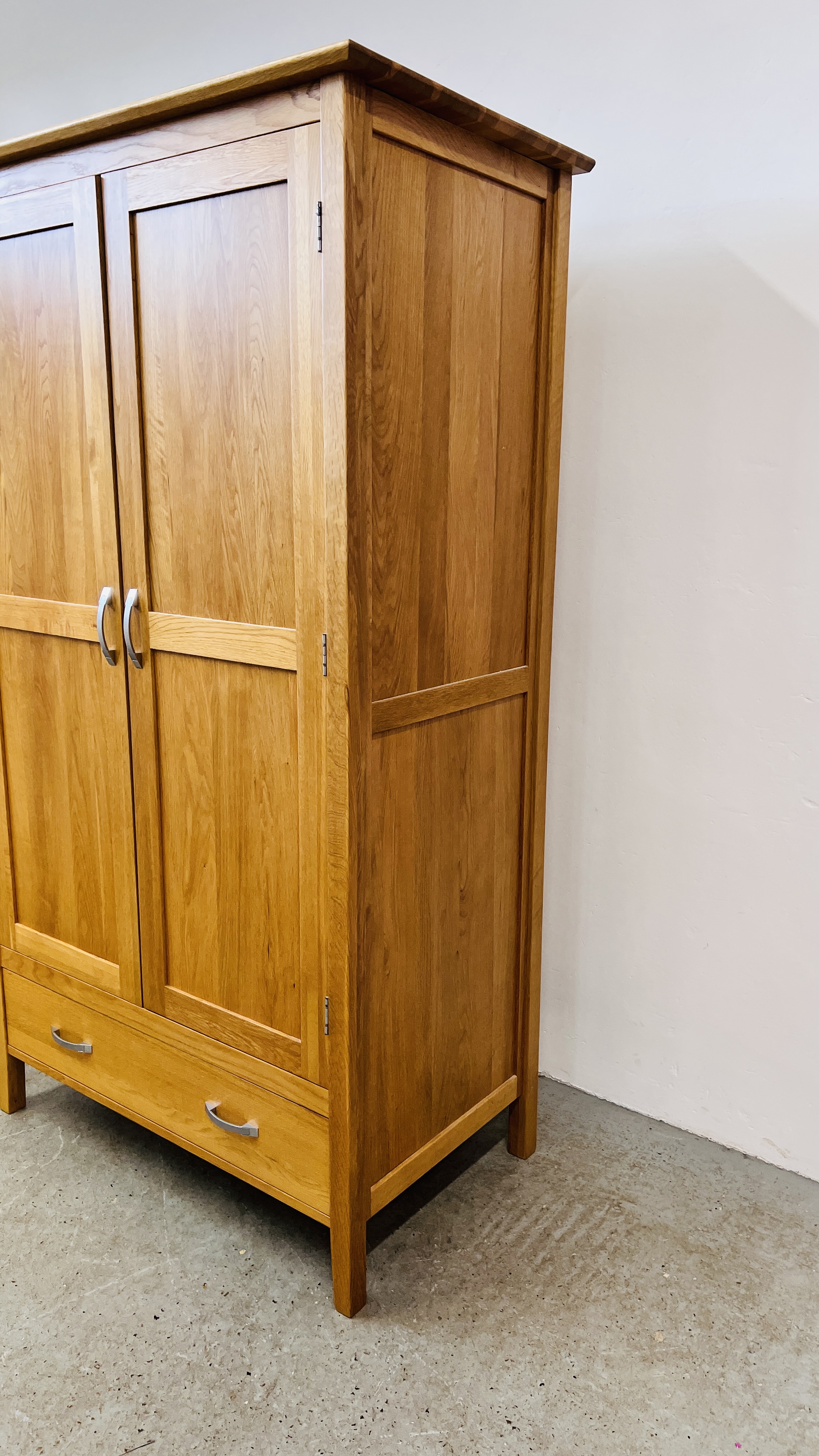 A SOLID LIGHT OAK DOUBLE WARDROBE WITH DRAWER TO BASE, W - 110CM, D - 60CM, H - 191CM. - Image 2 of 8