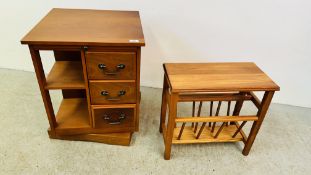 A CHERRYWOOD FINISH REVOLVING MEDIA STAND WITH DRAWERS ALONG WITH A HARDWOOD MAGAZINE RACK.