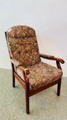 A GOOD QUALITY UPHOLSTERED HIGH SEAT ARM CHAIR.