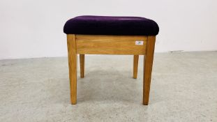 A WILLIS & GAMBIER SOLID LIGHT OAK FRAMED DRESSING STOOL WITH PURPLE UPHOLSTERED SEAT.