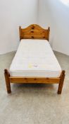 A SOLID HONEY PINE SINGLE BEDSTEAD WITH JOHN LEWIS 'SOLENT' MATTRESS.