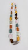 A STRAND OF VENETIAN GLASS BEADS, L 44CM.