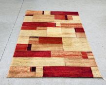 A MASTERCRAFT RED / ORANGE RAGOLLE GALLERIA CARPET, 230CM X 160CM.