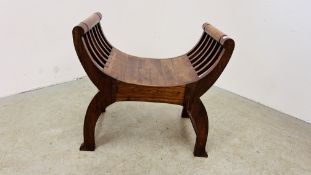 A RUSTIC HARDWOOD CAESAR STYLE CHAIR / STOOL.