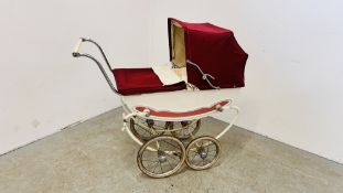 A VINTAGE TANSAD COACH BUILT DOLLS PRAM AND DOLLS.