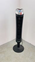 A HONEYWELL QUIET SET TOWER FAN WITH REMOTE - SOLD AS SEEN.