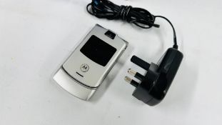 SAMSUNG SMART PHONE MODEL SM-J320FN WITH CHARGER AND CASE PLUS MOTOROLA RAZR V3 FLIP PHONE COMPLETE