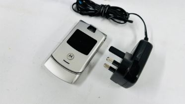 SAMSUNG SMART PHONE MODEL SM-J320FN WITH CHARGER AND CASE PLUS MOTOROLA RAZR V3 FLIP PHONE COMPLETE