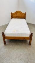 A SOLID HONEY PINE SINGLE BEDSTEAD WITH JOHN LEWIS 'SOLENT' MATTRESS.