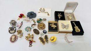 COLLECTION OF APPROX 28 BROOCHES INCLUDING ANIMAL AND FAIRY DESIGN.