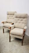 A PAIR OF YEOMAN UPHOLSTERY HIGH BACK ARMCHAIRS.