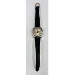 A VINTAGE RETRO AVIA ALARM 17 JEWELS IN CABLOG WRIST WATCH ON BLACK LEATHER STRAP.