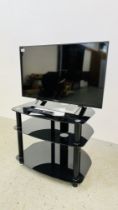 SONY BRAVIA 32" SMART TV COMPLETE WITH REMOTE AND STAND MODEL KDL-32WD756 - SOLD AS SEEN.