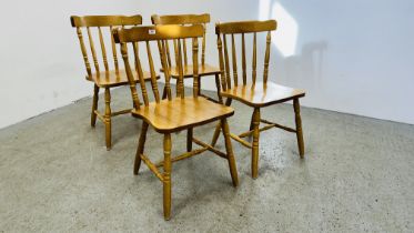 A SET OF FOUR SOLID BEECHWOOD KITCHEN CHAIRS.