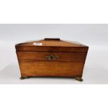 A VINTAGE MAHOGANY WOODEN TEA CADDY ON FOUR BRASS SPLAYED CLAW FEET. 12" X 8" X 7".