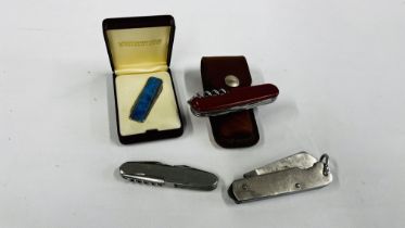 A VICTORINOX SWISS ARMY KNIFE CLASSIC DELUXE AND 3 OTHER MULTI TOOL KNIVES - NO POSTAGE OR PACKING.