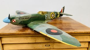 LARGE SPITFIRE MODEL RC AIRCRAFT FITTED WITH ENGINE - LENGTH 137CM - SOLD AS SEEN.