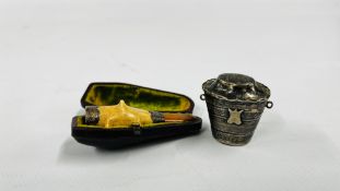 A VINTAGE SILVER BOX IN THE FORM OF A TAPERING BUCKET AND A VINTAGE SILVER MOUNTED CHEROOT IN A