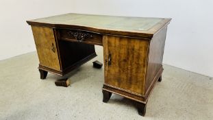 OAK FRAMED KNEE HOLE DESK WITH GREEN TOOLED LEATHERETTE TOP A/F CONDITION.